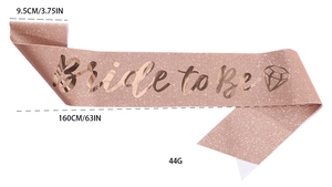 Detail showing 9.5cm wide rose gold glitter Bride to Be sash with diamond icon dimensions