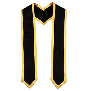 Detail of satin graduation honor stole in black with gold trim showing texture and v-neck
