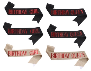 Detail view of glitter Birthday Girl and Queen sashes in black and rose gold options