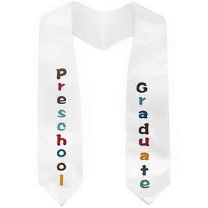 Detail of white satin preschool graduation stole featuring colorful graduate lettering