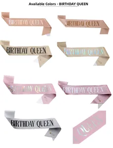 Detail view of glitter birthday sashes in 7 colors with Birthday Queen text and safety pin