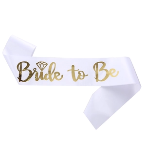 White satin Bride to Be sash with gold foil lettering and diamond graphic for hen parties