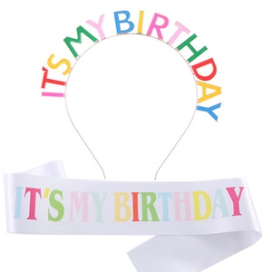 Birthday party set featuring colorful IT'S MY BIRTHDAY metal headband and white satin sash