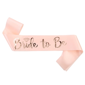Pink satin Bride to Be sash with rose gold foil lettering and diamond icon for parties