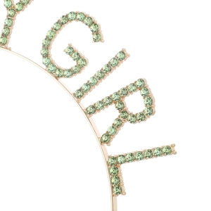 Macro shot of Birthday Girl headband featuring light green rhinestones and gold alloy frame
