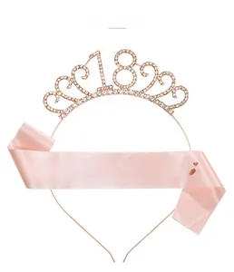 Detail of rose gold 18th birthday tiara with rhinestones and pink 18 & Fabulous sash