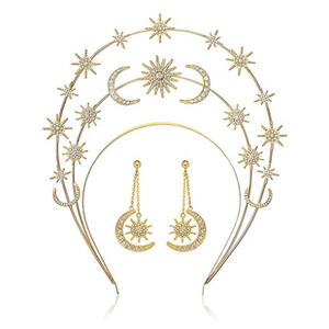 Detailed view of bridal gold crown and moon earrings set with sparkling rhinestones