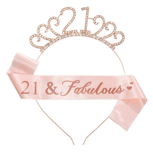 Detail of rose gold 21st birthday tiara and pink 21 & Fabulous satin party sash