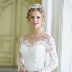 Elegant silver alloy crystal tiara for bridal weddings or parties shown on a model