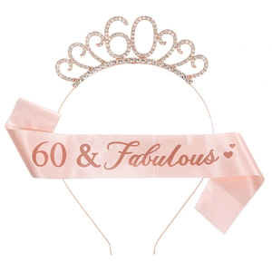 Detail of 60th birthday rose gold tiara and pink sash with 60 & Fabulous glitter text