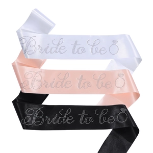 Three satin Bride To Be sashes in white, pink and black with sparkling rhinestones