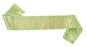 Close-up of light green satin birthday sash with metallic gold Happy Birthday text