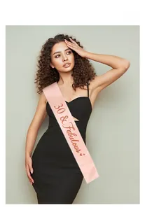 Pink satin birthday sash featuring 30 & Fabulous glitter calligraphy and heart design