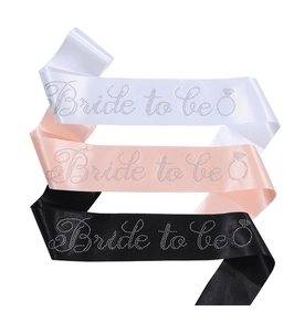 Detail of satin Bride to Be sashes with sparkling rhinestones in white, pink and black