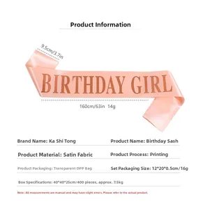 Detail showing 160x9.5cm rose gold satin sash with Birthday Girl printed lettering