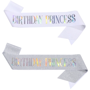 Detail of glitter fabric birthday princess sashes with rainbow laser lettering