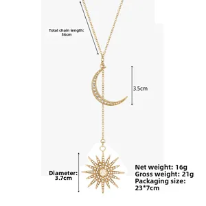 Detail view of gold sun and moon necklace showing 56cm chain length and pendant dimensions