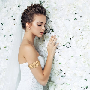 Golden laurel leaf upper arm cuff bracelet with Greek bohemian bridal style jewelry