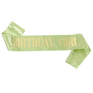 Light green satin Birthday Girl sash with elegant gold lettering for party celebrations