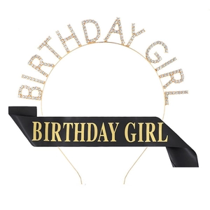 Detail of rose gold BIRTHDAY GIRL headband and black satin sash with gold lettering