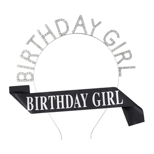 Close-up of birthday girl set with rhinestone headband and black satin sash decoration