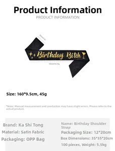 Detail of black satin Birthday Bitch sash with gold glitter text 160x9.5cm dimensions