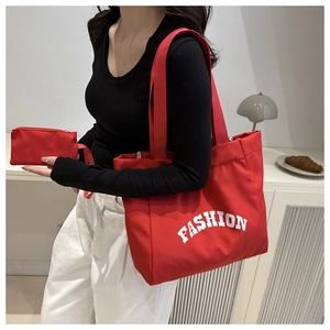 Red large capacity canvas tote bag set with FASHION lettering and matching small zip pouch