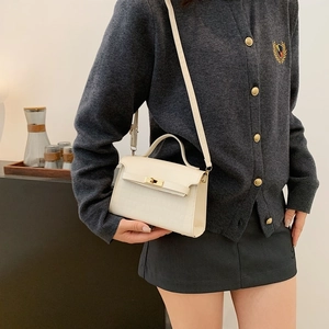 Chic off-white crocodile embossed crossbody bag with gold lock for minimalist fashion