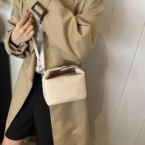 Chic beige woven texture handbag for women with gold hardware and adjustable strap