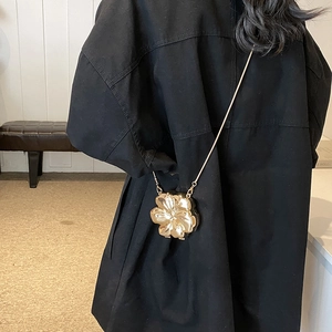 Elegant gold flower shaped hard shell chain bag for women with fine metal shoulder strap