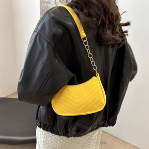 Retro yellow hobo bag with V-shaped stitching and golden chain strap for women