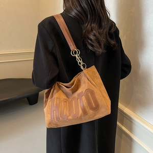 Brown matte suede tote bag with embossed HOOTO letters and leather chain strap