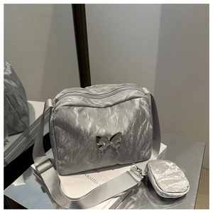 Silver-grey wrinkled nylon shoulder bag with butterfly detail and mini pouch set