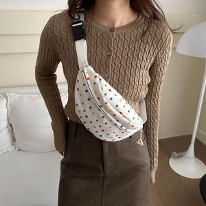 Women's crossbody chest bag with colorful polka dots on white canvas for casual wear