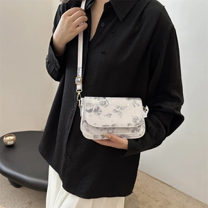 Elegant white crossbody bag with butterfly print and gold metal buckle for women