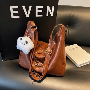 Vintage Women Large Capacity PU Leather Shoulder Bag With Cross Lacing Bow Detail And Plush Charm Commuter Hobo Tote Bag