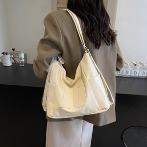 Cream white large capacity tote bag with stitched number 10 and lace ribbon detail