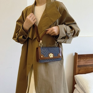 Retro rectangle crossbody bag with blue patterned fabric and brown leather trim