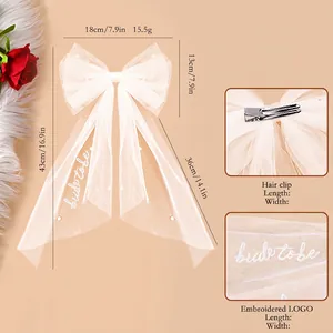 White mesh bow hair clip with pearls and Bride to Be embroidery for wedding party