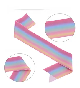 Close-up of rainbow gradient glitter fabric texture for birthday party headband