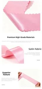 Detail of pink satin sash featuring scalloped laser-cut edges and smooth glossy finish
