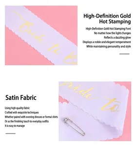 Detail of lavender satin Bride to Be sash with gold foil text and rhinestone pin