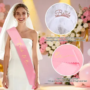 Pink satin Bride to Be sash with scalloped edges and rose gold bridal veil headband set