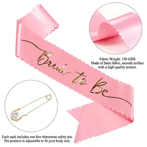 Pink satin Bride to Be sash with gold foil text and rhinestone pin for wedding parties