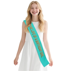 Tiffany blue birthday girl sash with golden text worn by a model in a white dress