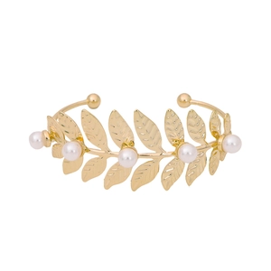 Elegant gold-plated leaf arm cuff featuring symmetrical olive branch design with five pearls