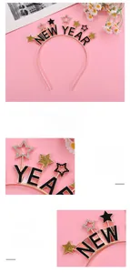 Gros plan du serre-tête étoile doré avec lettrage NEW YEAR et strass brillants