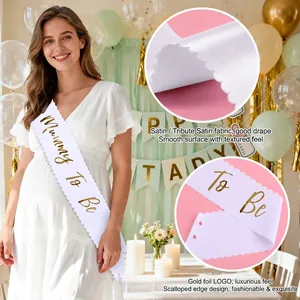 White satin Mummy To Be sash with gold foil lettering and scalloped edges for baby shower