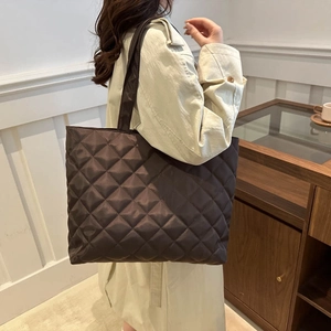 Quilted dark brown tote bag with diamond stitching for commuting and daily wear