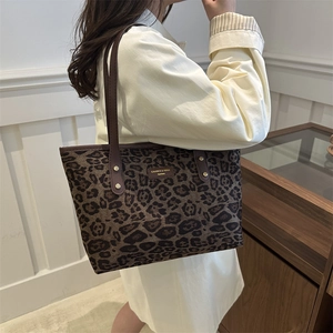 Chic leopard print tote bag with brown leather straps and large capacity for women